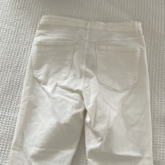 White skinny jeans with rips in knees - Picture 5 of 6